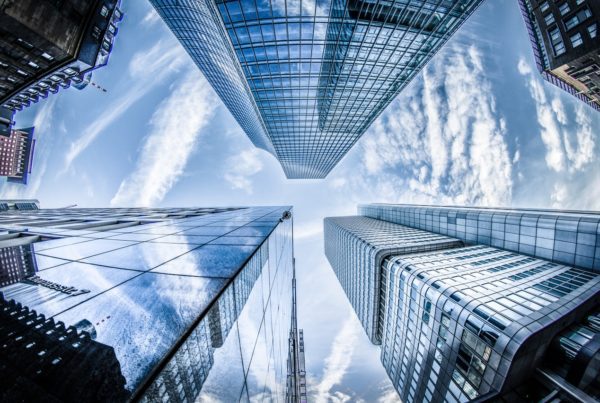 Picture of skyscrapers with interior and exterior window film