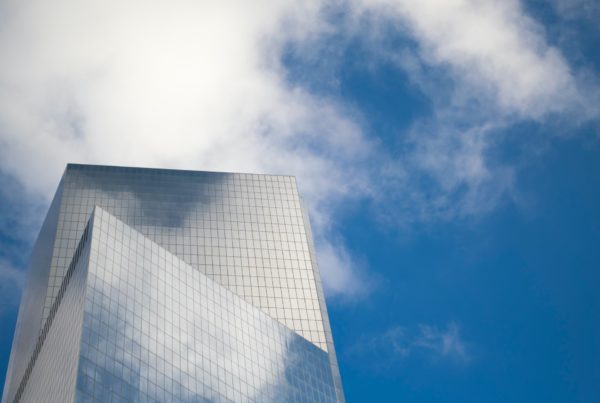 Commercial building with one-way mirror film